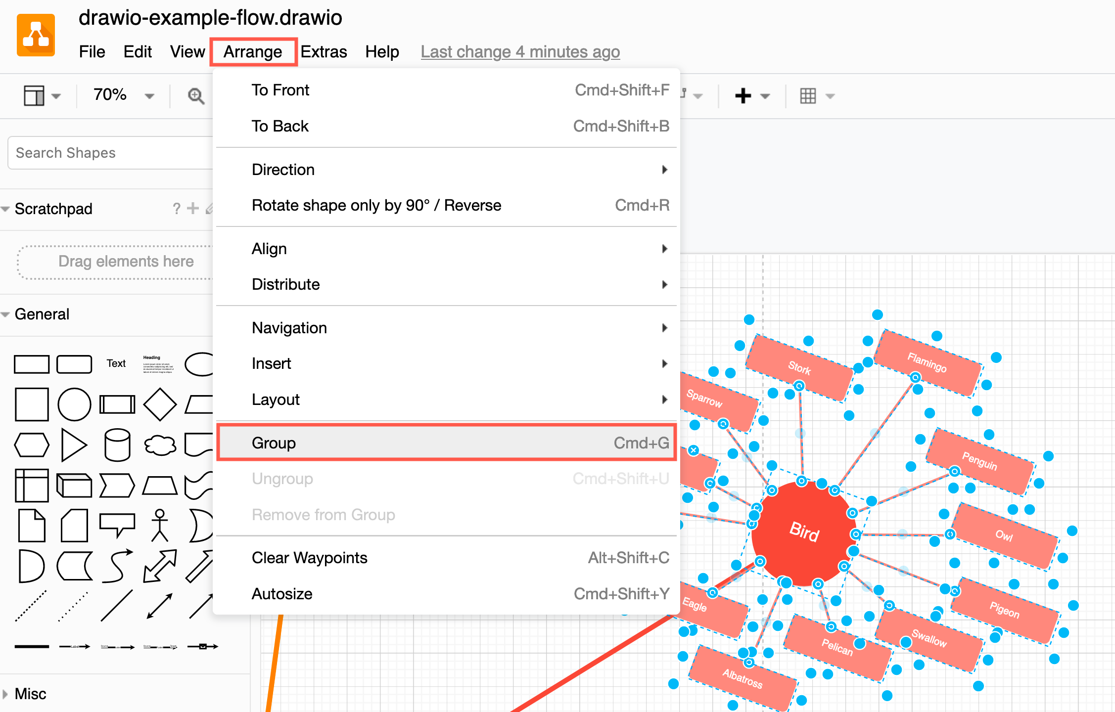 Group selected shapes and connectors via Arrange /> Group in the menu